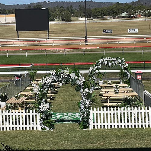 artificial plants at horse racing event